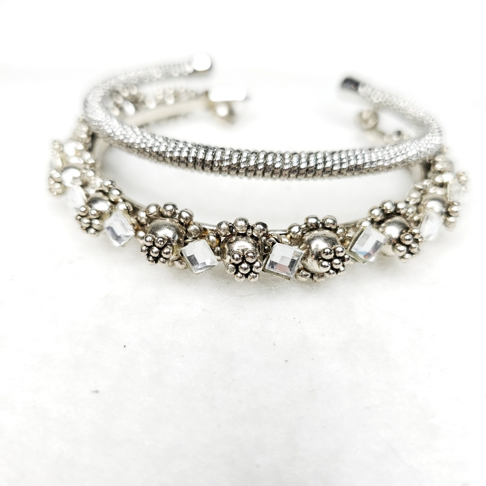 Two Silver C-Style Cuff Bracelets